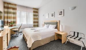 Posteľ alebo postele v izbe v ubytovaní 404 Rooms Wilanowska