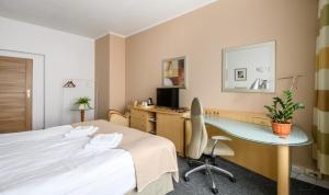 Posteľ alebo postele v izbe v ubytovaní 404 Rooms Wilanowska