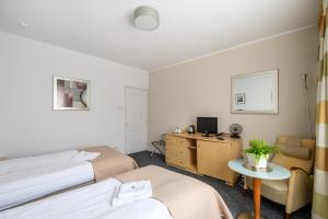 Posteľ alebo postele v izbe v ubytovaní 404 Rooms Wilanowska