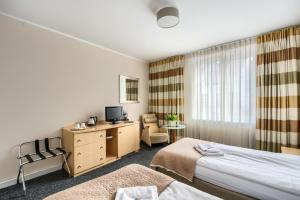 Posteľ alebo postele v izbe v ubytovaní 404 Rooms Wilanowska