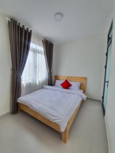 Postel nebo postele na pokoji v ubytování Hello Dalat Hostel
