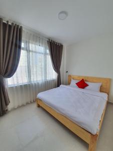 Postel nebo postele na pokoji v ubytování Hello Dalat Hostel