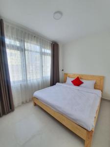 Postel nebo postele na pokoji v ubytování Hello Dalat Hostel