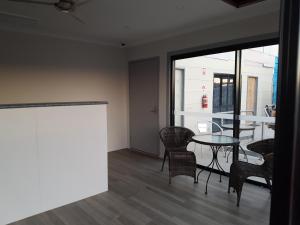 Balkón nebo terasa v ubytování Reef Gardens Motel