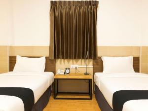 Letto o letti in una camera di K.C Residence