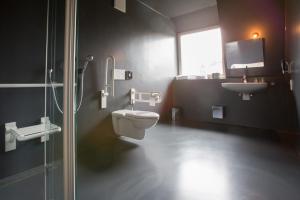 Koupelna v ubytování Hotel Heimathafen