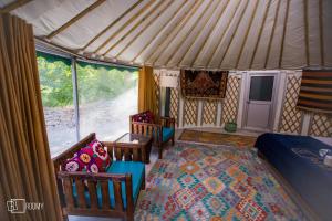 A seating area at Roomy Yurts, Minapin Nagar Hunza