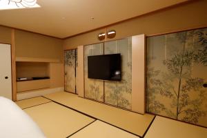 TV a/nebo společenská místnost v ubytování Hotel Gajoen Tokyo + 37 fotografií