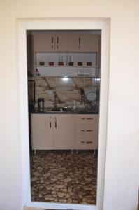 Kuchyň nebo kuchyňský kout v ubytování Guesthouse Qarim