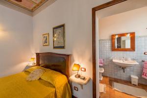 Postel nebo postele na pokoji v ubytování Agriturismo CaseGraziani