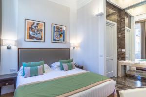 Cama ou camas em um quarto em Internazionale Domus