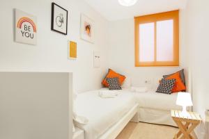 Posteľ alebo postele v izbe v ubytovaní Stay U-nique Apartments Ricart