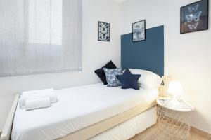 Posteľ alebo postele v izbe v ubytovaní Stay U-nique Apartments Ricart