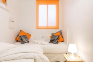 Posteľ alebo postele v izbe v ubytovaní Stay U-nique Apartments Ricart