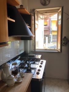 مطبخ أو مطبخ صغير في Sicily for you Apartment