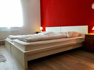 Ein Bett oder Betten in einem Zimmer der Unterkunft Ferienhaus "Auf dem Bremsberg"