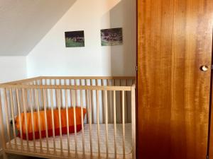 Ein Bett oder Betten in einem Zimmer der Unterkunft Ferienhaus "Auf dem Bremsberg"