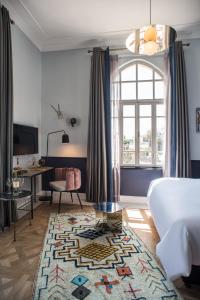 Postel nebo postele na pokoji v ubytování Elmina Hotel Jaffa