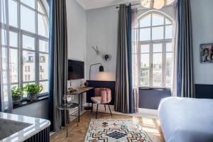 TV a/nebo společenská místnost v ubytování Elmina Hotel Jaffa