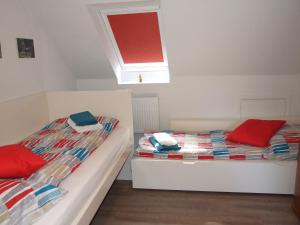 Ein Bett oder Betten in einem Zimmer der Unterkunft Ferienhaus "Auf dem Bremsberg"