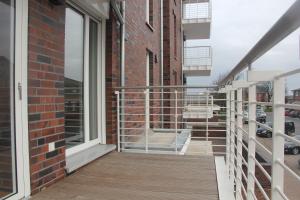 Ein Balkon oder eine Terrasse in der Unterkunft Wohnen am Yachthafen W45