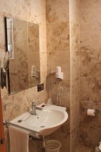 Kylpyhuone majoituspaikassa Hotel Peña Escrita