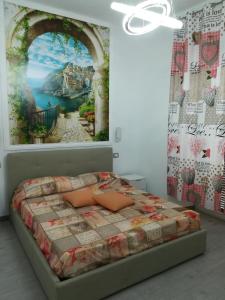 Een bed of bedden in een kamer bij Affittacamere Mediterraneo Rooms