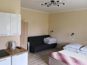 Postel nebo postele na pokoji v ubytování Rybacka 28