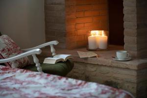 A bed or beds in a room at Villa Pianora