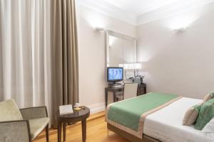 Cama ou camas em um quarto em Internazionale Domus
