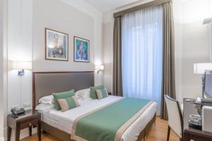 Cama ou camas em um quarto em Internazionale Domus