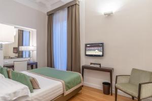 Cama ou camas em um quarto em Internazionale Domus