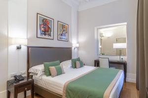 Cama ou camas em um quarto em Internazionale Domus
