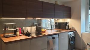 A kitchen or kitchenette at The SPIRIT OF LUCCA with all comfortable amenities