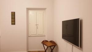 TV a/nebo společenská místnost v ubytování The SPIRIT OF LUCCA with all comfortable amenities