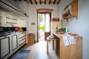 A kitchen or kitchenette at Villa Pianora