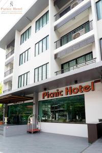 a hotel building with a sign that reads prakrit hotel at Picnic Hotel Bangkok - Rang Nam in Bangkok