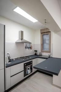 A kitchen or kitchenette at Villa Joy - Iconic Heritage Rooms