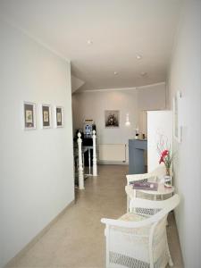 Kuchyň nebo kuchyňský kout v ubytování Hotel Villa Meeresgruss
