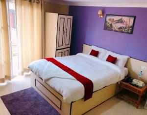 Postel nebo postele na pokoji v ubytování Hotel Tranquil