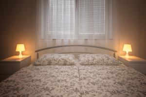 Postel nebo postele na pokoji v ubytování Sobe Meta