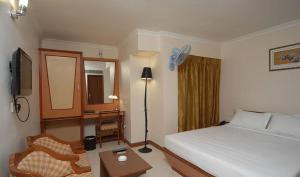 Cama o camas de una habitación en Epsilon Hotel