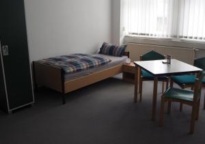 Postel nebo postele na pokoji v ubytování Hostel jo-si