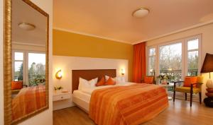 Postel nebo postele na pokoji v ubytování Hotel Garni Inselparadies Zingst
