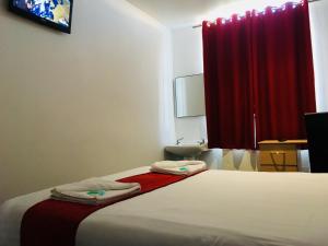 Postel nebo postele na pokoji v ubytování Hotel Express Newcastle Gateshead