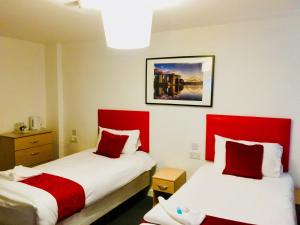 Postel nebo postele na pokoji v ubytování Hotel Express Newcastle Gateshead