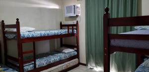 Katil atau katil-katil dalam bilik di Casa Praia das Dunas Residence Club +49 gambar