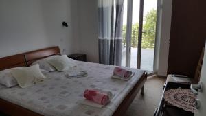 Postel nebo postele na pokoji v ubytování Holiday House Maretta - Apartment No 1