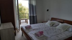 Postel nebo postele na pokoji v ubytování Holiday House Maretta - Apartment No 1