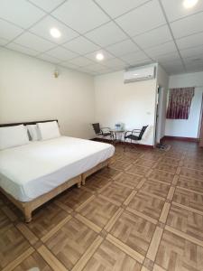 Uma cama ou camas num quarto em Xiao Guilin Homestay